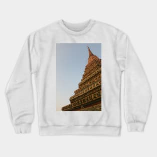 First unusual low angle view of a Buddha stupa against clear sky. Crewneck Sweatshirt